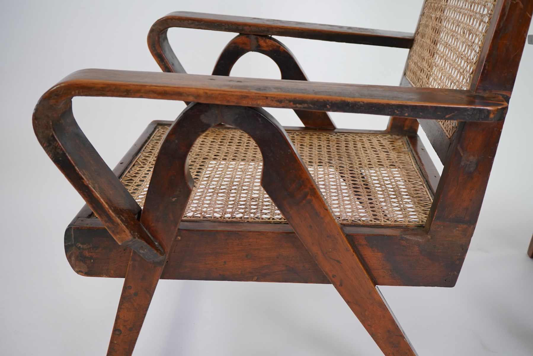 Pierre Jeanneret (Swiss, 1896-1967) for Chandigarh: A pair of teak armchairs PJ-010610